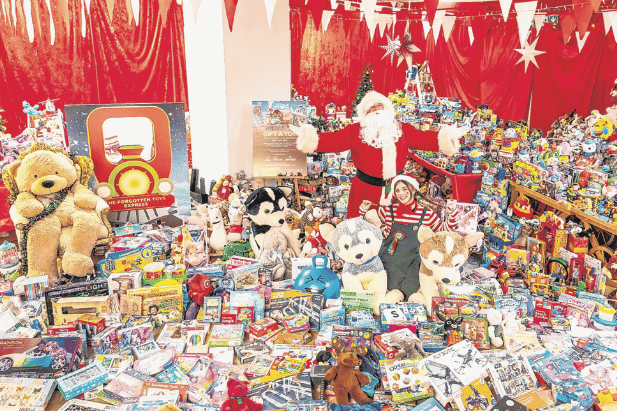 Santa with some of the toys donated to the appeal