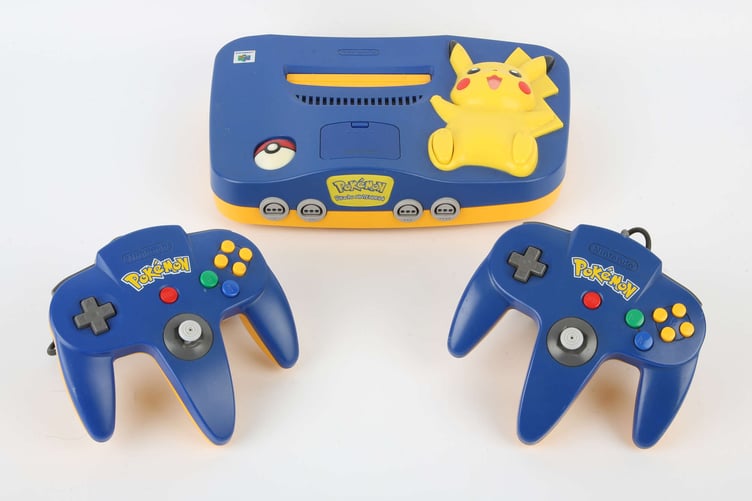 Among the items going under the hammer in the timed auction at Ewbank’s on January 3 are a Nintendo 64 (N64) Pikachu Blue console with two Pokémon controllers, in unboxed condition