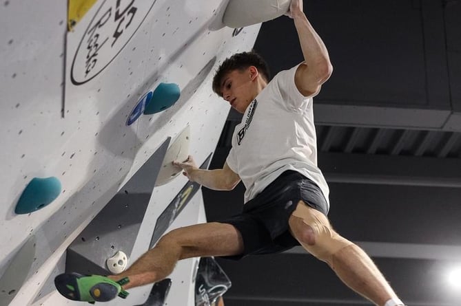 Rhys Conlon on his way to victory at the Blokfest bouldering festival in London 