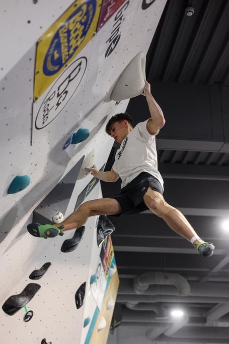 Rhys Conlon on his way to victory at the Blokfest bouldering festival in London 