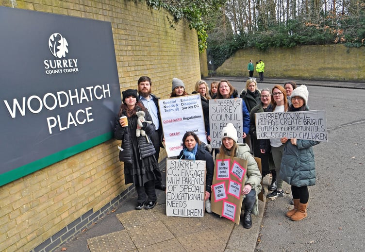 Parents protesting outside Surrey County Council, Woodhatch Place, Cockshot Hill, Reigate. Complaining about the lack of resources for parents of children with special educational needs.  GL