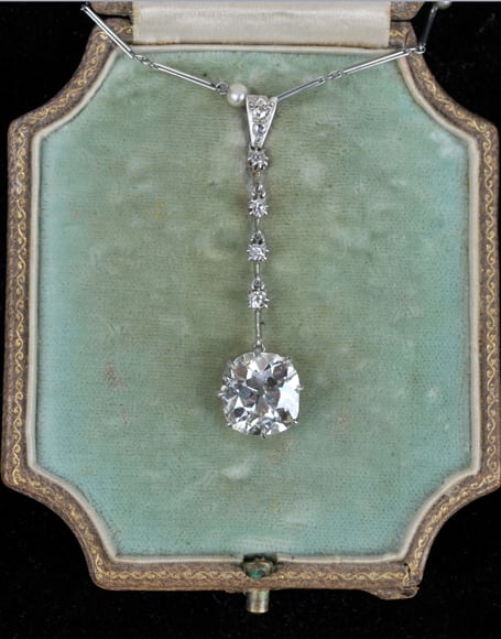 A diamond drop pendant featuring an Old Mine-cut diamond, weighing an estimated 3.72 carats, stole the show in a sale at the Burnt Common Auction Rooms in Send