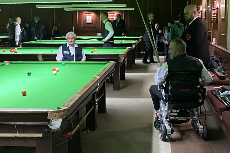 Wheelchair-bound players enjoying a game at Woking Snooker Centre