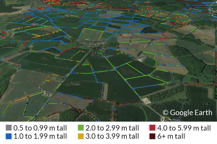 Hedgerow map overlaid on the Lincolnshire landscape. Release date January 30 2024. See SWNS story SWLNhedges. A new high tech map of England's hedgerows have revealed they are now long enough to go round the world - ten times. The laser scanning shows a total of 390,000 km of hedgerows (one to six metres tall) in the country. Hedgerows contain hundreds of plant species, provide homes for nesting birds, small mammals and insects, and capture and store large amounts of carbon. Ecologists and scientists from the UK Centre for Ecology & Hydrology hedgrow hope the new map will guide planting and restoration of the vulnerable habitats.