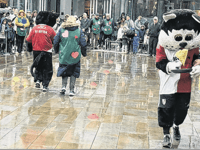 Woking Security batters competition and rain in annual pancake race