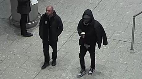 CCTV footage of the two wanted men who violently assaulted a taxi driver at Heathrow Airport