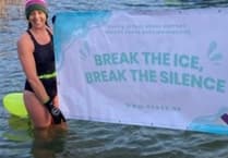 Horsell domestic violence campaigner takes on icy swim in memory of murdered family