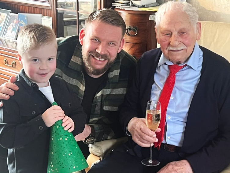 Kazys "Sam" Lisauskas, 103, with his great-grandson Frankie, 4, and grandson Julian