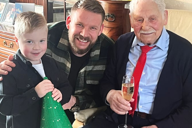 Kazys "Sam" Lisauskas, 103, with his great-grandson Frankie, 4, and grandson Julian