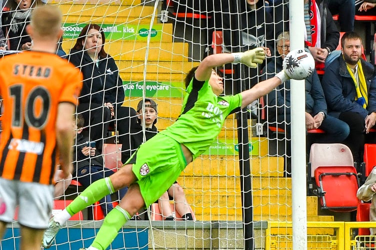 Action from Woking's 1-0 win against Barnet
