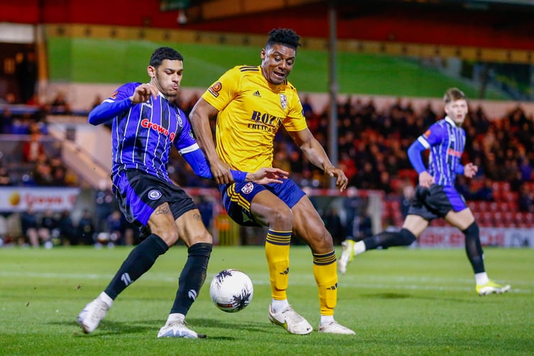 Action from Woking's 2-1 defeat at Rochdale