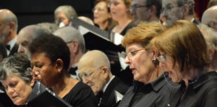 Celebrated composer prepares Woking choir for concert
