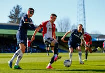 Woking continue good form with valuable point at Southend United