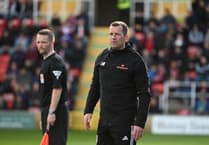 Woking slip to National League defeat against FC Halifax Town at The Shay