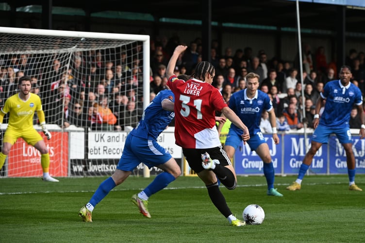 Action from Woking's 1-0 defeat against Eastleigh on Good Friday (Photo: Andy Fitzsimons)