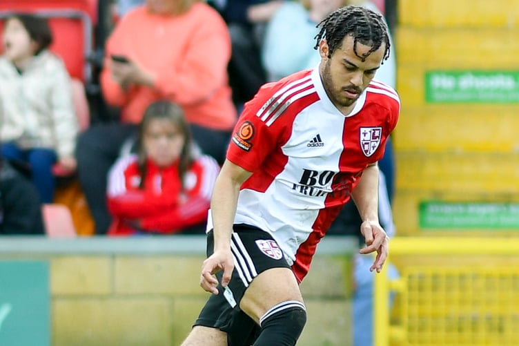 Man-of-the-match Dion Kelly-Evans in action (Photo: Woking FC)