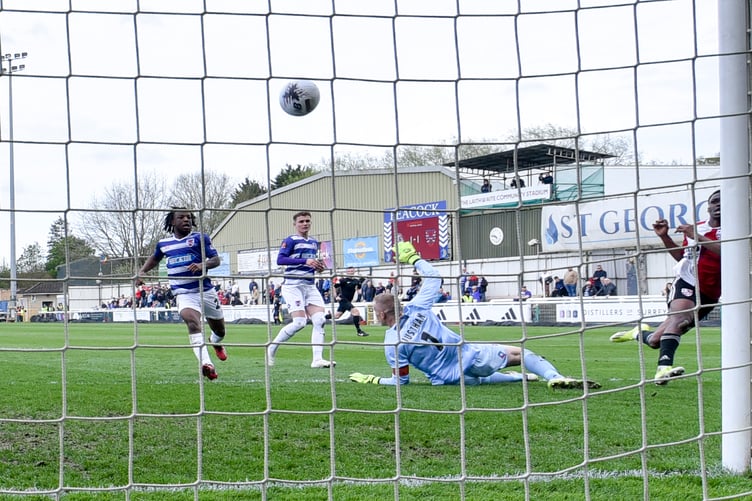 Kevin Berkoe (right) scores Woking's second goal (Photo: Woking FC)