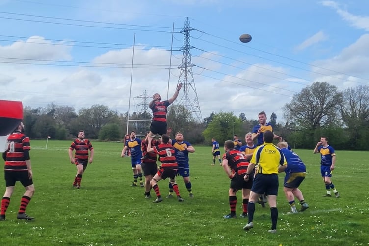 Action from Woking's 39-33 win against Raynes Park on Saturday