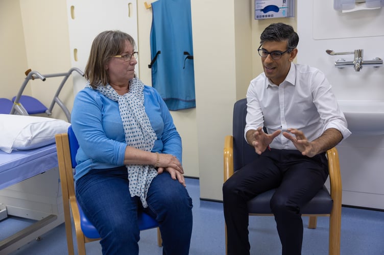 11/04/2024. Woking, United Kingdom. The Prime Minister Rishi Sunak visits Woking Community Hospital where he met staff and spoke with a patient having a bone diagnostic test in the Community Diagnostic Centre. Picture by Simon Walker / No 10 Downing Street