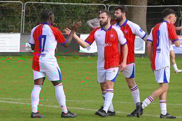 Jose Sani celebrates his goal with Tom Drinkwater, Knaphill v Colliers Wood United, April 13th 2024.