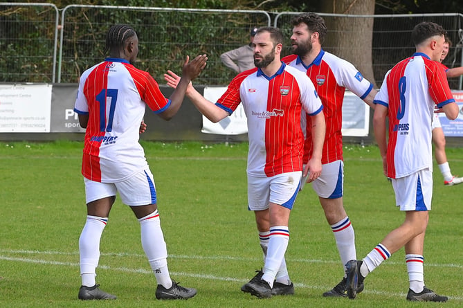 Jose Sani celebrates his goal with Tom Drinkwater, Knaphill v Colliers Wood United, April 13th 2024.