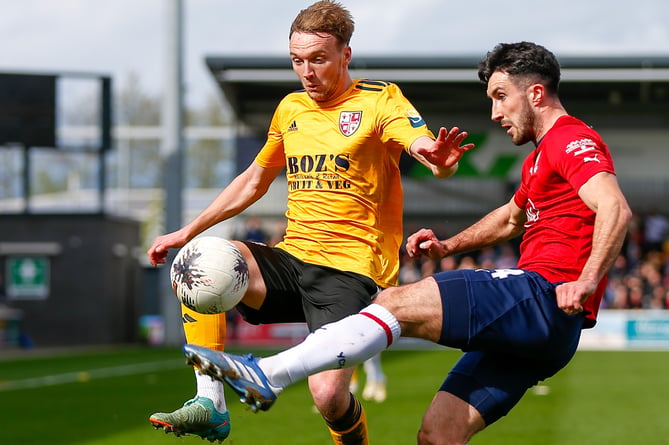 Action from Woking's 2-0 defeat at York City on Saturday (Photo: Phil Fiddes)
