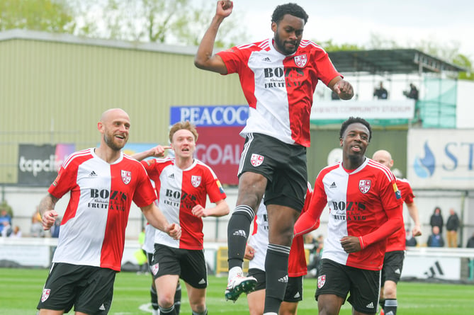 Tunji Akinola celebrates (Photo: Woking FC)