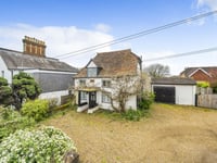 Period cottage for sale is "real eye catcher" with character features 