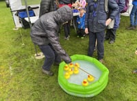 Scouts and Guides shrug off rain at May Fayre
