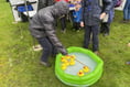Scouts and Guides shrug off rain at May Fayre