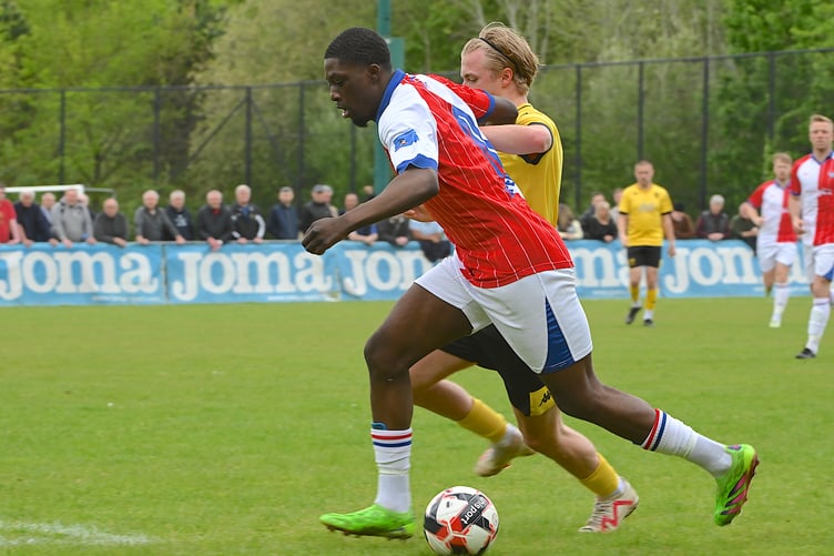 Knaphill's Calvin Camara in action against Tadley Calleva (Photo: Knaphill FC)