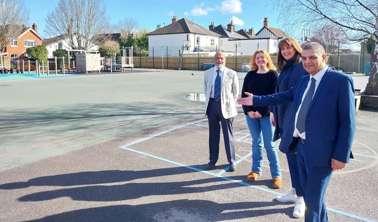 Hassan Akberali, left, with, from left to right, Vikki Zeila, PTA vice-chair, Debbie Harrison, headmistress, and Saj Hussain