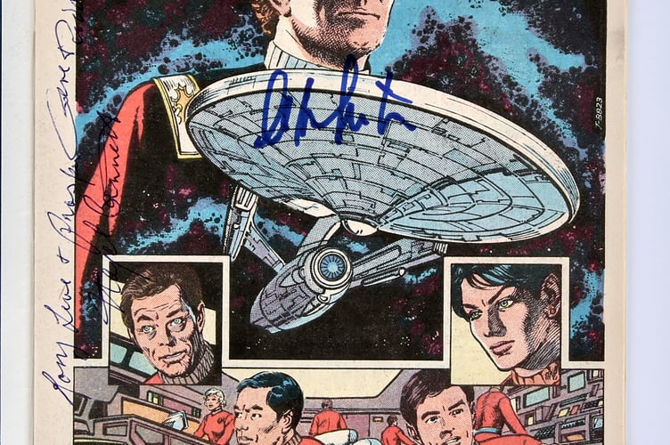 Star Trek No. 1 with nine main cast member signatures
