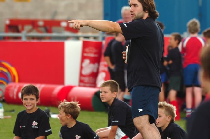 Emanuele Palladino running a rugby training academy