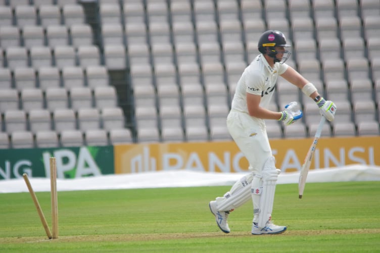 Jamie Smith is bowled by Michael Neser in Surrey's first innings (Photo: Mark Sandom)