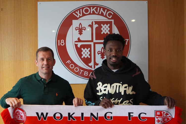 Timi Odusina (right) has joined Woking permanently (Photo: Woking FC)