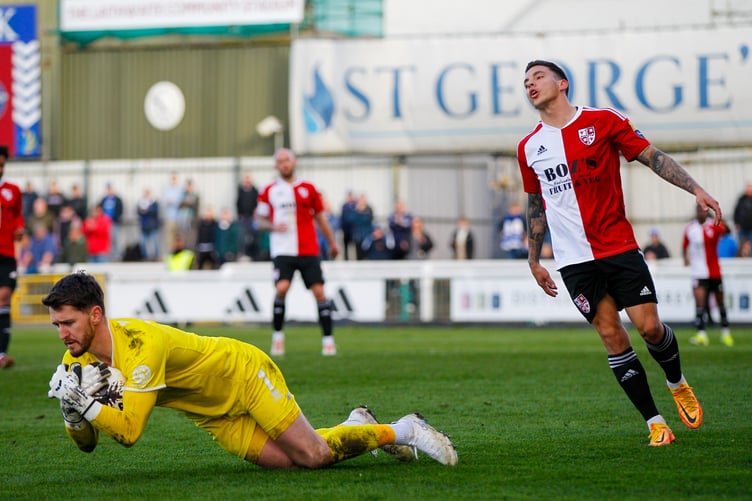 Reece Grego-Cox (right) in action for Woking against Eastleigh last season