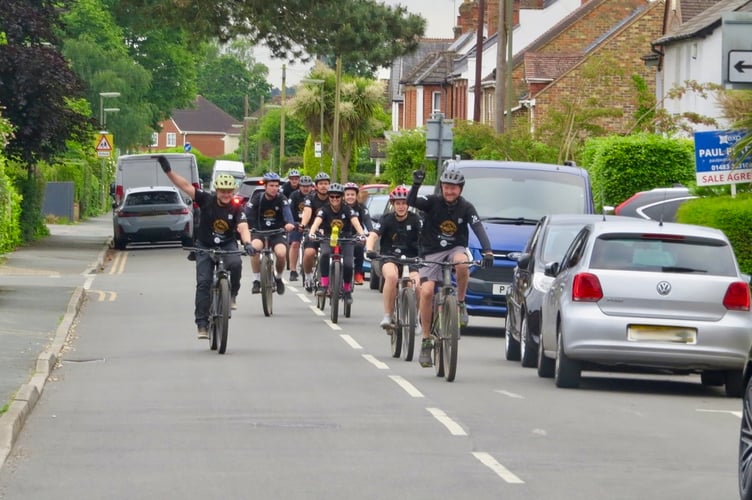 Cyclists take a moment to rejoice on their long journey                         