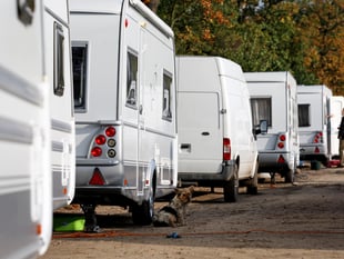 Dozens of Traveller caravans in Woking