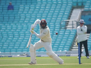 Blake shines as Surrey stay ahead