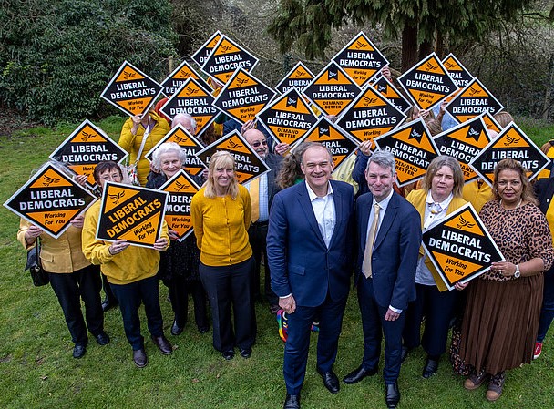 Will Forster, with Lib Dem leader Ed Davey, Woking Borough Council leader Ann Marie Barker and councillors and activists