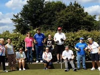 Bowling Club welcomes charity to the green