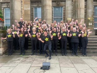 Rock Choir members return home after performing at fringe