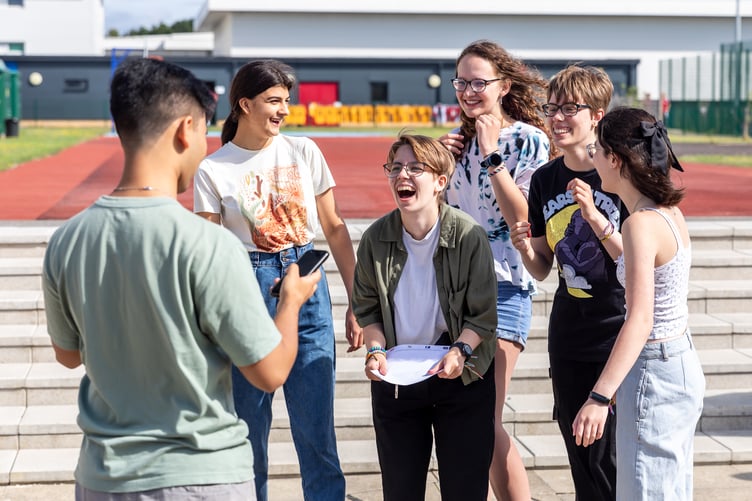 Smiles and laughter as results were revealed and exchanged with fellow students