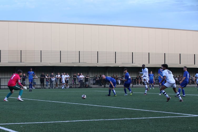 Action from Sheerwater's 4-3 defeat against Corinthian Casuals