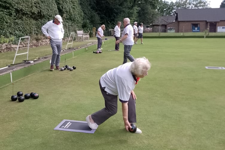 Action from Mayford Hall Bowls Club's 87-65 defeat against Woking Park