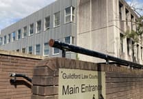 Fine and points for roofer caught on phone whilst driving in West Byfleet