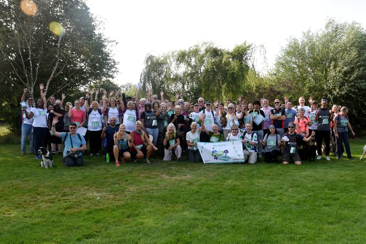 The walkers celebrate after finishing the event