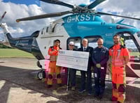 Horsell Bowling Club helps keep air ambulance flying high