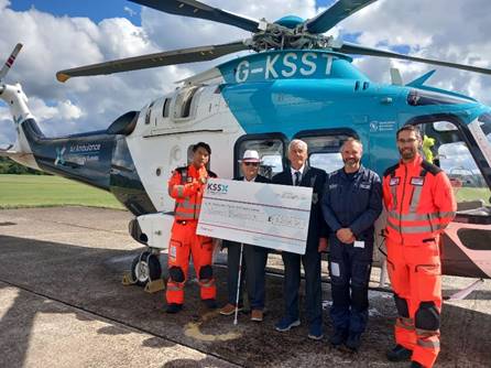 Horsell Bowling Club helps keep air ambulance flying high